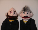 Two commentator puppets