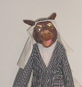 A donkey puppet dressed as a shepherd