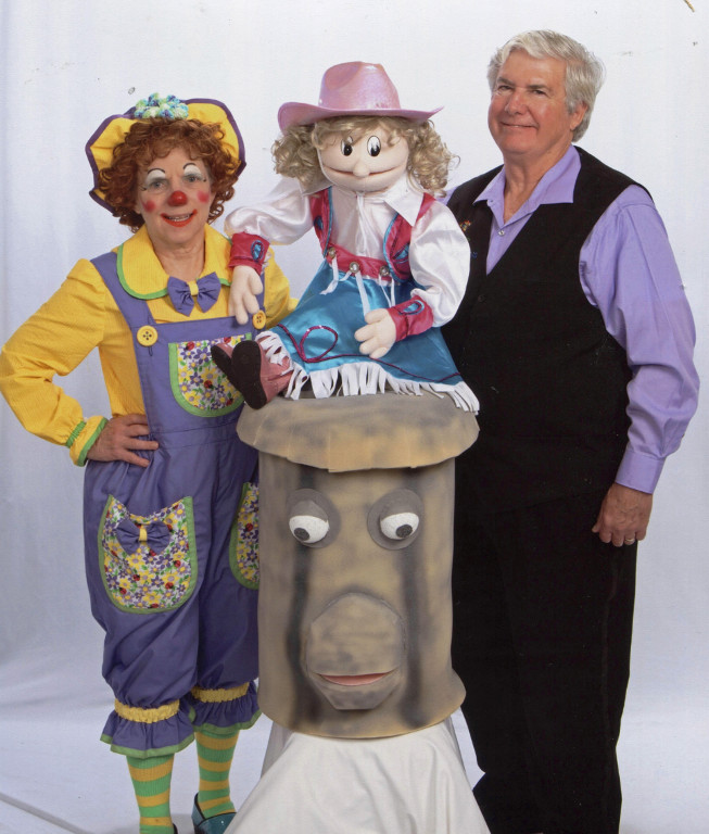 Rainbow, Mr. T., a puppet in a pink hat, and the trashcan puppet